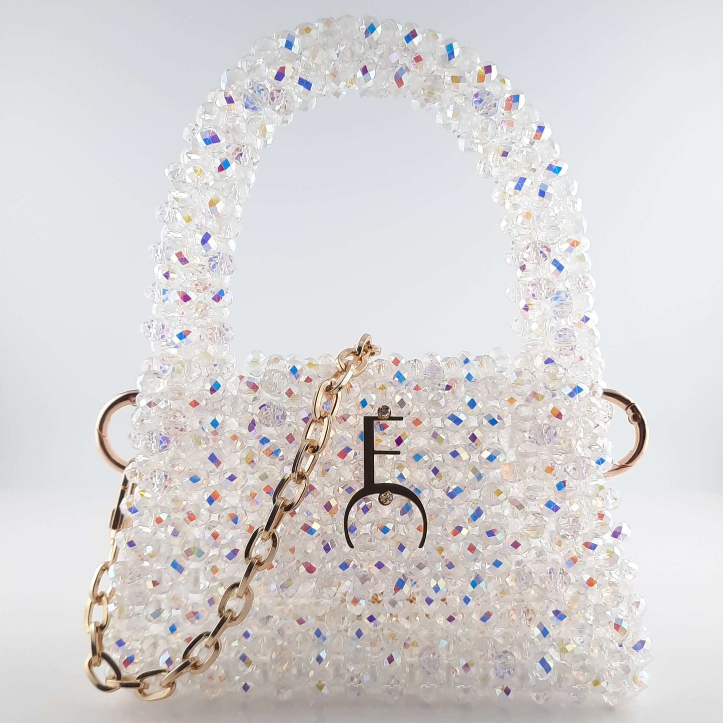  Mini sac en perles de cristal blanc et sa bandoulière amovible.