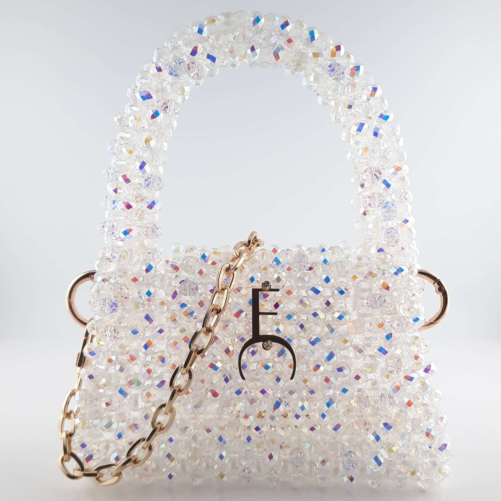  Mini sac en perles de cristal blanc et sa bandoulière amovible.